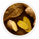 Prime Biome review: a top-down view of organic Ceylon ginger, with a whole root, several slices, and a wooden spoon with ginger powder.