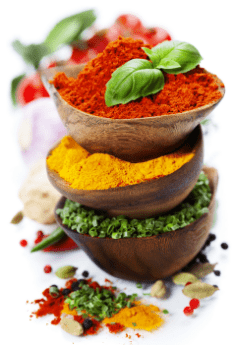 An image from the Sleep Lean review illustrating the **Sleep Lean ingredients** section, showing a stack of bowls filled with various spices and herbs, including red paprika, yellow turmeric, and fresh basil.
